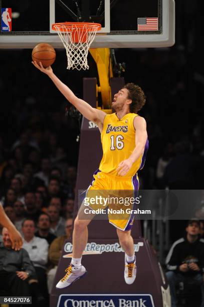 Pau Gasol of the Los Angeles Lakers goes up for a reverse layup against the Charlotte Bobcats at Staples Center on January 27, 2009 in Los Angeles,...