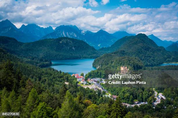 alpsee lake and hohenschwangau castle - hohenschwangau castle stock pictures, royalty-free photos & images