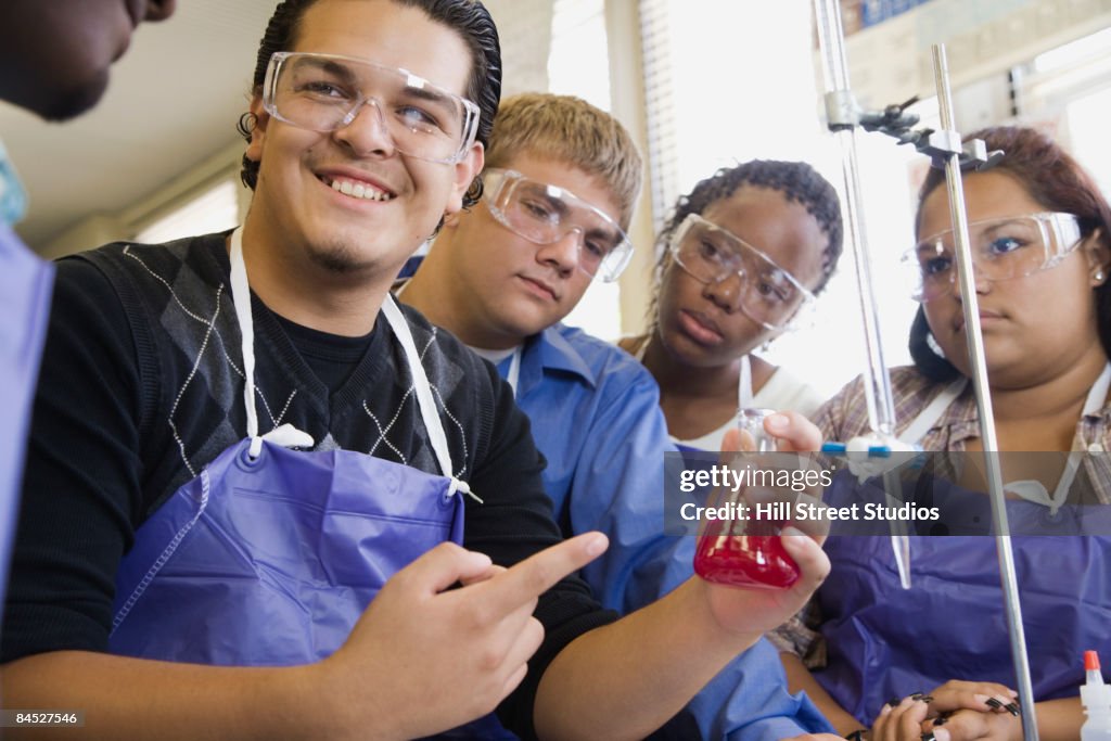 Students performing experiment in chemistry lab