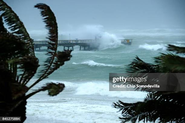 Large waves produced by Hurricane Irma crash into the end of Anglins Fishing Pier September 10, 2017 in Fort Lauderdale, Florida. The category 4...