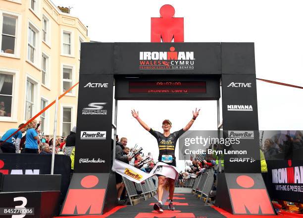 Cameron Wurf of Australia crosses the line to win IRONMAN Wales on September 10, 2017 in Tenby, Wales.