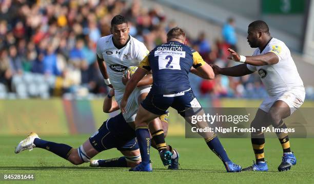 Worcester Warriors' Jack Singleton tackles Wasps' Nathan Hughes during the Aviva Premiership match at the Sixways Stadium, Worcester.