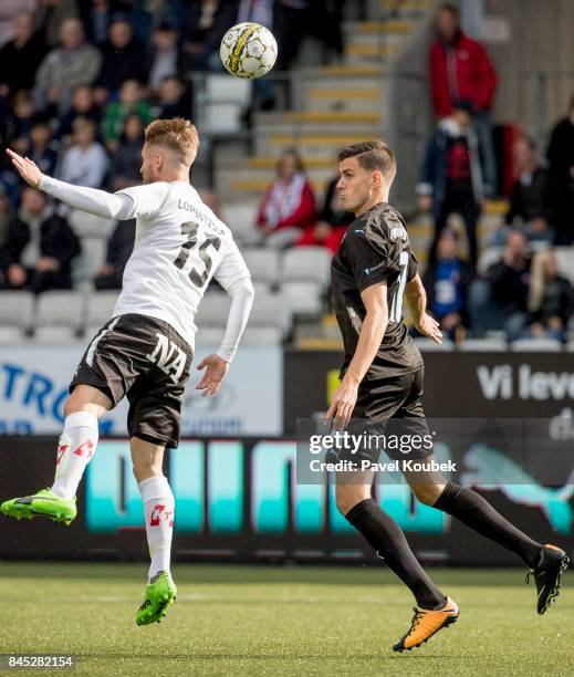 Martin Lorentzson of Orebro SK & Alexander Jeremejeff of Malmo FF during the Allsvenskan match between Orebro SK and Malmo FF at Behrn Arena on...