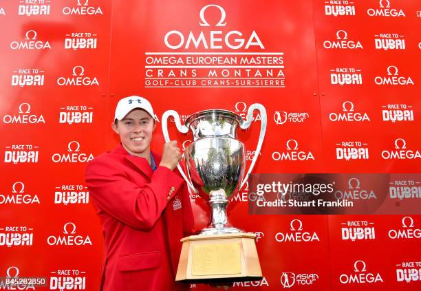 Matthew Fitzpatrick of England poses with the trophy after Day Five of the Omega European Masters at Crans-sur-Sierre Golf Club on September 10, 2017...