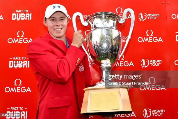 Matthew Fitzpatrick of England poses with the trophy after Day Five of the Omega European Masters at Crans-sur-Sierre Golf Club on September 10, 2017...