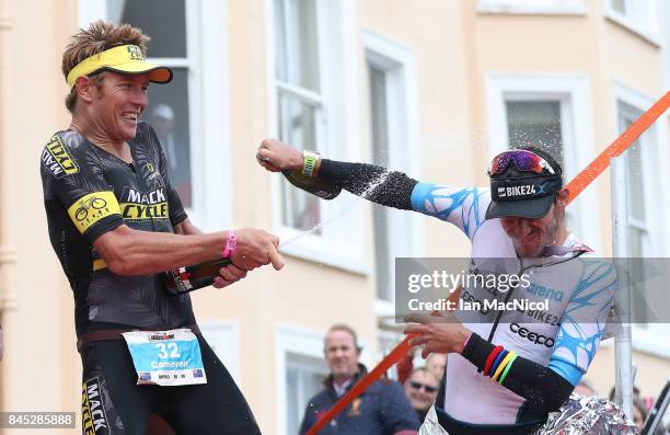 Cameron Wurf of Australia celebrates after he wins the Men's race during the Ironman Wales competiton on September 10, 2017 in Tenby, Wales.