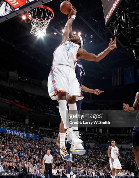 Chris Wilcox of the Oklahoma City Thunder goes up for a dunk during a game against the Memphis Grizzlies at the Ford Center on January 28, 2009 in...