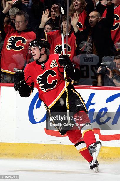 Dion Phaneuf of the Calgary Flames celebrates a goal against the Buffalo Sabres on January 28, 2009 at Pengrowth Saddledome in Calgary, Alberta,...