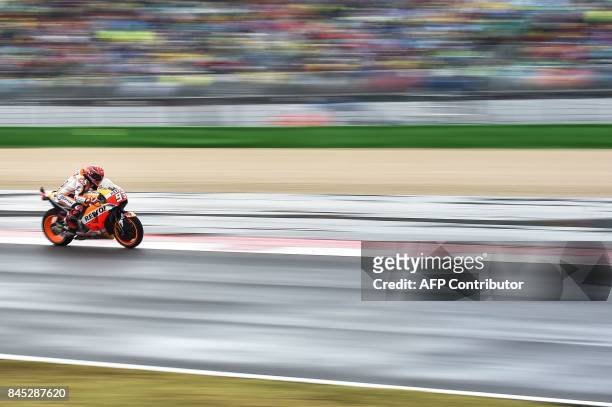 Repsol Honda Team's Spanish rider Marc Marquez competes during the San Marino Moto GP Grand Prix at the Marco Simoncelli Circuit in Misano, on...
