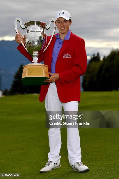 Matthew Fitzpatrick of England poses with the trophy after Day Five of the Omega European Masters at Crans-sur-Sierre Golf Club on September 10, 2017...