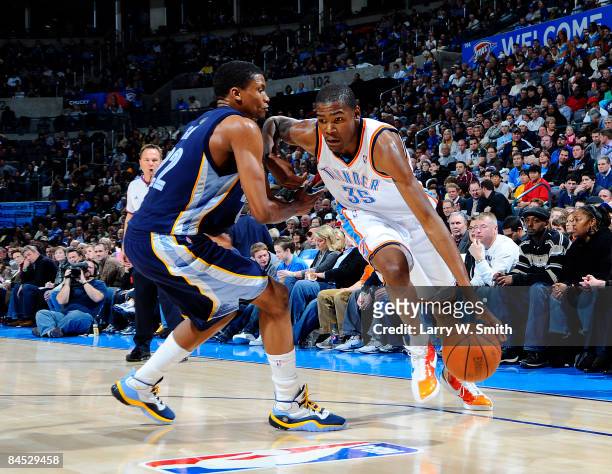 Kevin Durant of the Oklahoma City Thunder goes to the basket against Rudy Gay of the Memphis Grizzlies at the Ford Center on January 28, 2009 in...