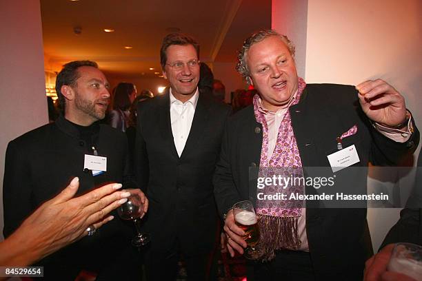 Guido Westerwelle , chairman of the Free Democratic Party, talks with Jimmy Wales , founder of wikipedia.com and Frank Asbeck , CEO of SolarWorld AG,...