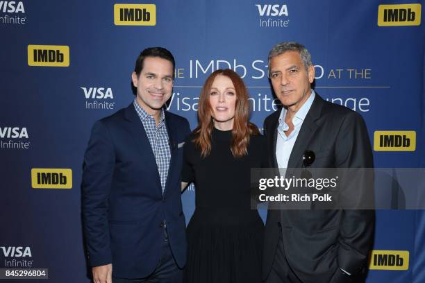 Host Dave Karger, actress Julianne Moore and director George Clooney of 'Suburbicon' attend The IMDb Studio Hosted By The Visa Infinite Lounge at The...