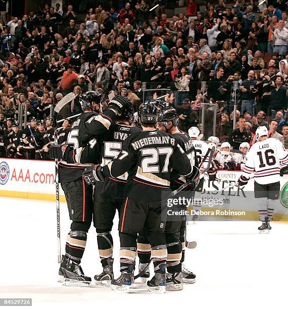 The Anaheim Ducks celebrate a goal from teammate Chris Pronger during the game against the Chicago Blackhawks on January 28, 2009 at Honda Center in...