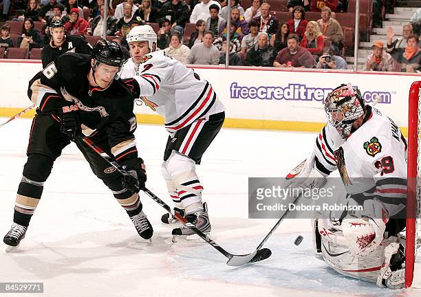 Nikolai Khabibulin of the Chicago Blackhawks saves a shot from a Samuel Pahlsson of the Anaheim Ducks during the game on January 28, 2009 at Honda...