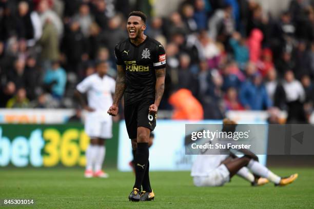 Jamaal Lascelles of Newcastle United celebrates victory during the Premier League match between Swansea City and Newcastle United at Liberty Stadium...