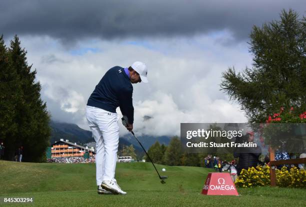 Matthew Fitzpatrick of England plays his tee shot on the 18th hole during the final round of the Omega European Masters at Crans-sur-Sierre Golf Club...