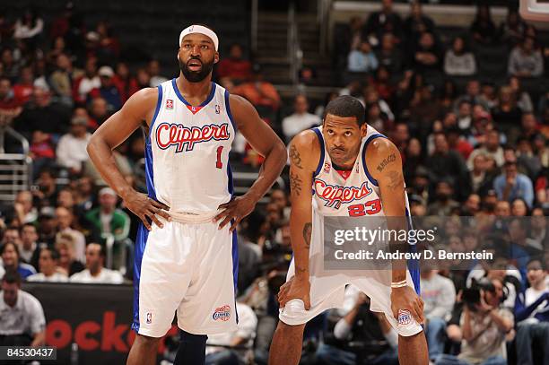 Baron Davis and Marcus Camby of the Los Angeles Clippers look on during their game against the Chicago Bulls at Staples Center on January 28, 2009 in...