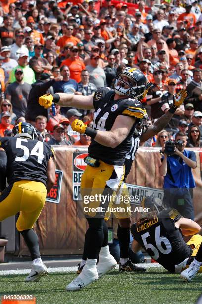 Tyler Matakevich of the Pittsburgh Steelers celebrates after blocking a punt for a touchdown in the first quarter against the Cleveland Browns at...