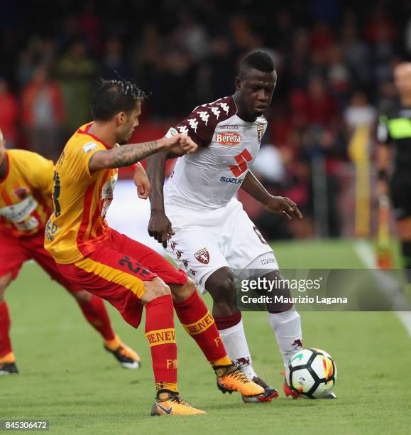 Lorenzo Venuti of Benevento competes for the ball with Afriyie Acquah of Torino during the Serie A match between Benevento Calcio and Torino FC at...