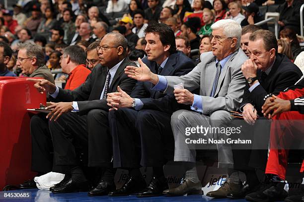 Head coach Vinny Del Negro of the Chicago Bulls sits between assistant coaches Bernie Bickerstaff and Del Harris during a game against the Los...