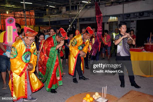 Ethnic Chinese Priests leads the people to offer prayers during the Chinese Hungry Ghost Festival on Sept. 10, 2017 in Kuala Lumpur, Malaysia. The...