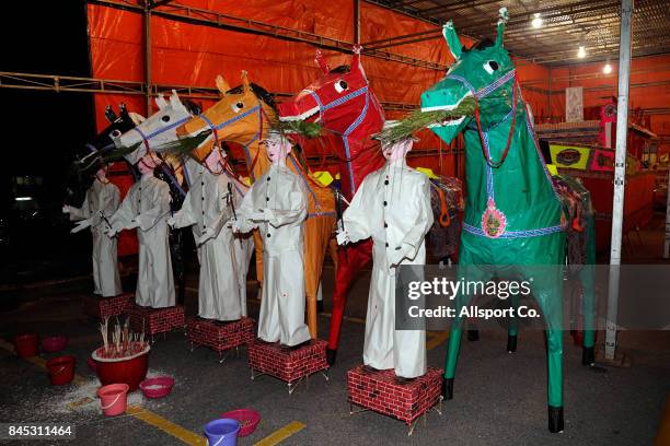 The paper-made horses that guards the hell gates the Chinese ethnic community believes during the Chinese Hungry Ghost Festival on Sept. 10, 2017 in...