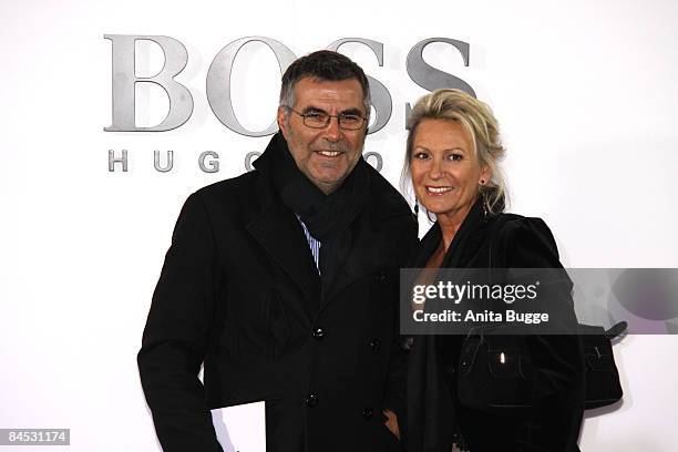 Sabine Christiansen and her husband Norbert Medus arrive at the ''Boss Black'' Fashion show at the start of the 2009 Berlin Fashionweek on January...