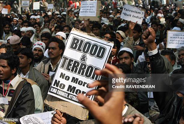 Muslim youths from Azamgarh, about 800 kms east of New Delhi, shout anti-Congress-led UPA government slogans during a rally in New Delhi on January...