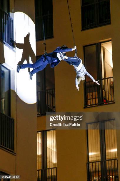 Models perform on the house wall runway at a QVC event during the Vogue Fashion's Night Out on September 8, 2017 in duesseldorf, Germany.