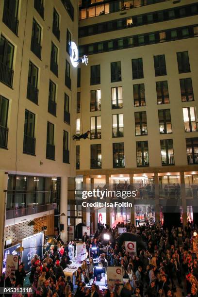 General view with models on the house wall runway at a QVC event during the Vogue Fashion's Night Out on September 8, 2017 in duesseldorf, Germany.