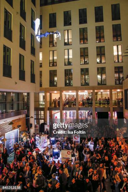 General view with models on the house wall runway at a QVC event during the Vogue Fashion's Night Out on September 8, 2017 in duesseldorf, Germany.