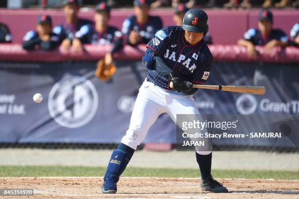 Kotaro Kiyomiya of Japan gets a base hit RBI during the third inning of a game against Canada during the WBSC U-18 Baseball World Cup Bronze Medal...