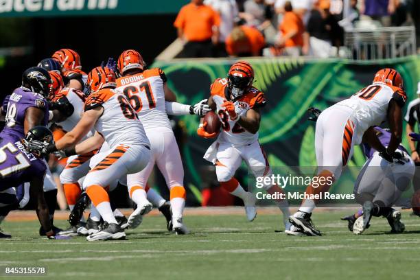 Jeremy Hill of the Cincinnati Bengals runs with the ball during the first quarter of the game against the Baltimore Ravens at Paul Brown Stadium on...