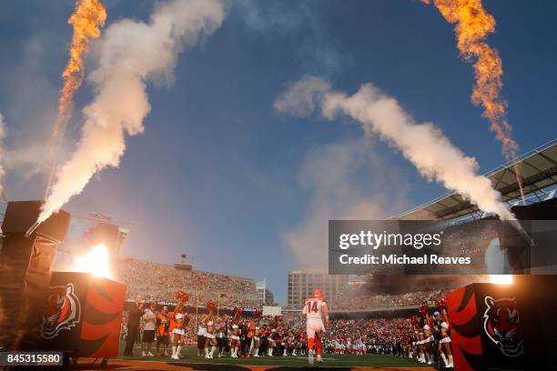 Andy Dalton of the Cincinnati Bengals runs on to the field prior to the start of the game against the Baltimore Ravens at Paul Brown Stadium on...