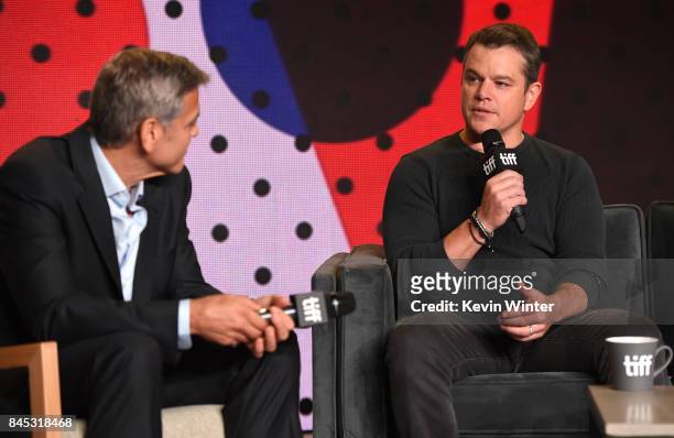 Writer/director/producer George Clooney and actor Matt Damon speak onstage at the "Suburbicon" press conference during the 2017 Toronto International...