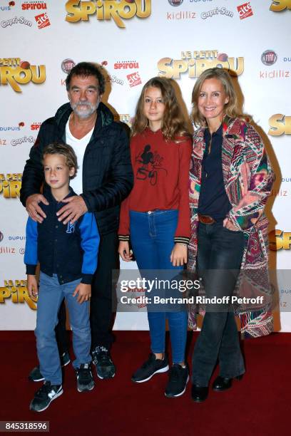 Actors Olivier Marchal, Catherine Marchal and their children Ninon and Basile attend the "Le Petit Spirou" Paris Premiere at Le Grand Rex on...