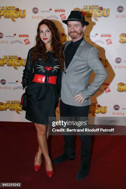 Singer of Musical Group Dionysos, Mathias Malzieu and his companion attend the "Le Petit Spirou" Paris Premiere at Le Grand Rex on September 10, 2017...