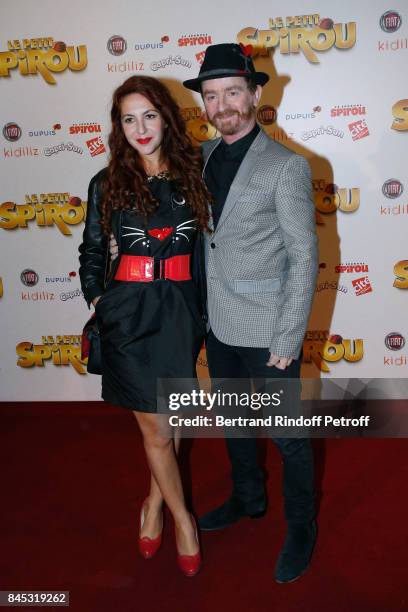 Singer of Musical Group Dionysos, Mathias Malzieu and his companion attend the "Le Petit Spirou" Paris Premiere at Le Grand Rex on September 10, 2017...