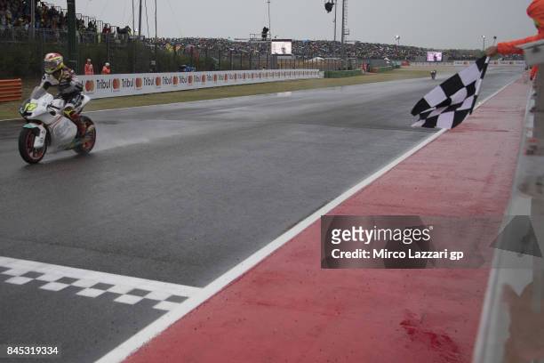 Dominique Aegerter of Switzerland and Kiefer Racing cuts the finish lane for the win at the end of the Moto2 Race during the MotoGP of San Marino -...