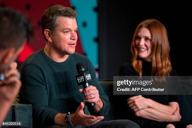 Matt Damon speaks next to Julianne Moore during the press conference for 'Suburbicon' at the Toronto International Film Festival in Toronto, Ontario...