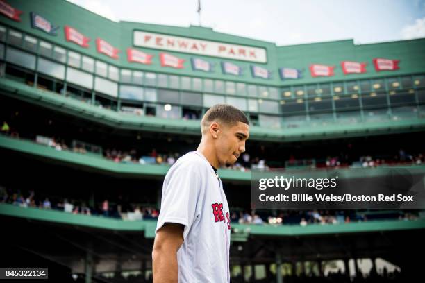 Boston Celtics first round draft pick Jayson Tatum is introduced before throwing out the ceremonial first pitch before a game between the Boston Red...