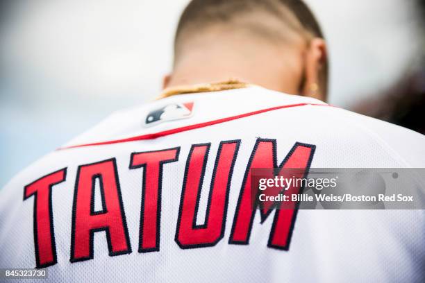 Boston Celtics first round draft pick Jayson Tatum looks on before throwing out the ceremonial first pitch before a game between the Boston Red Sox...