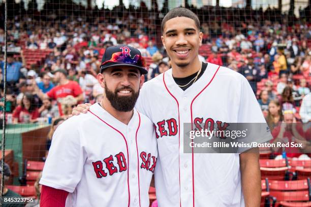 Boston Celtics first round draft pick Jayson Tatum poses for a photograph with Deven Marrero of the Boston Red Sox before throwing out the ceremonial...