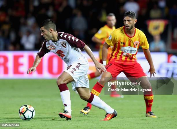 Achraf Lazaar of Benevento competes for the ball with Iago Falque of Torino during the Serie A match between Benevento Calcio and Torino FC at Stadio...