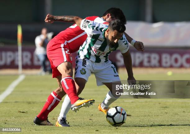 Vitoria Setubal midfielder Joao Costinha from Portugal with SC Braga forward Joao Carlos Teixeira from Portugal in action during the Primeira Liga...