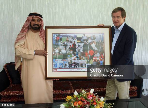 George O'Grady Chief Executive of the European Tour presents Mohamed Juma Buamaim The Vice Chairman and CEO of Golf in Dubai and with a commemorative...