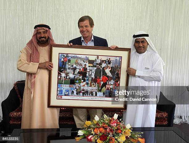 George O'Grady Chief Executive of the European Tour presents Mohamed Juma Buamaim The Vice Chairman and CEO of Golf in Dubai and Mohammed Yahya the...
