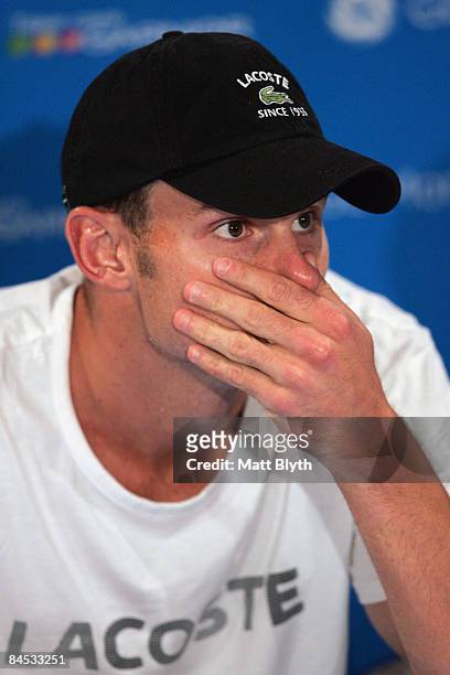 Andy Roddick of the United States of America talks to the media during a press conference after his semifinal match against Roger Federer of...