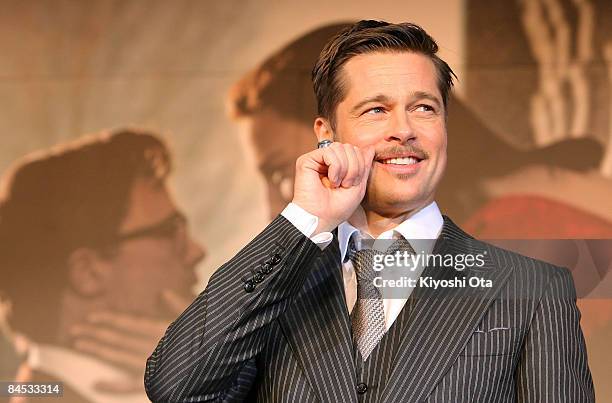 Actor Brad Pitt gestures as he attends 'The Curious Case of Benjamin Button' Japan Premiere at Roppongi Hills on January 29, 2009 in Tokyo, Japan....